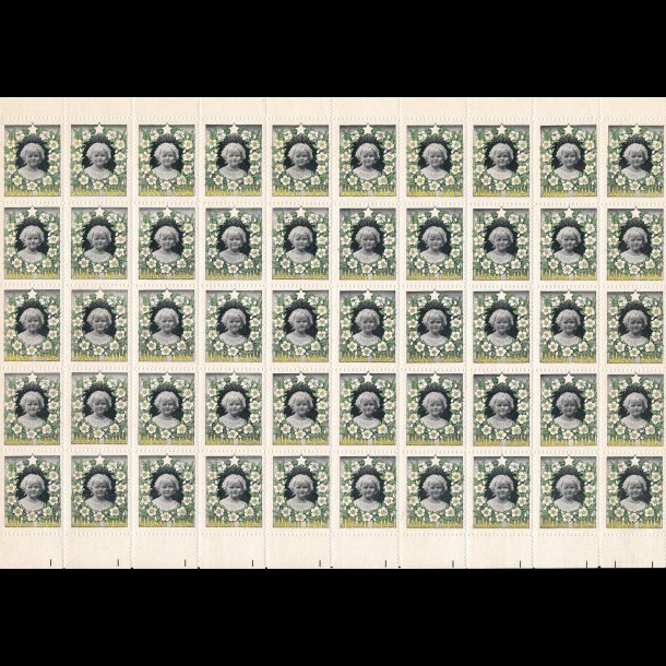 1909, Barnehoved i ramme af juleroser og julestjerner, helark, hele rand er intakt,