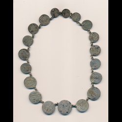 Skillingsmnter monteret som halssmykke,