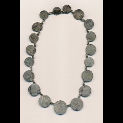 Skillingsmnter monteret som halssmykke,