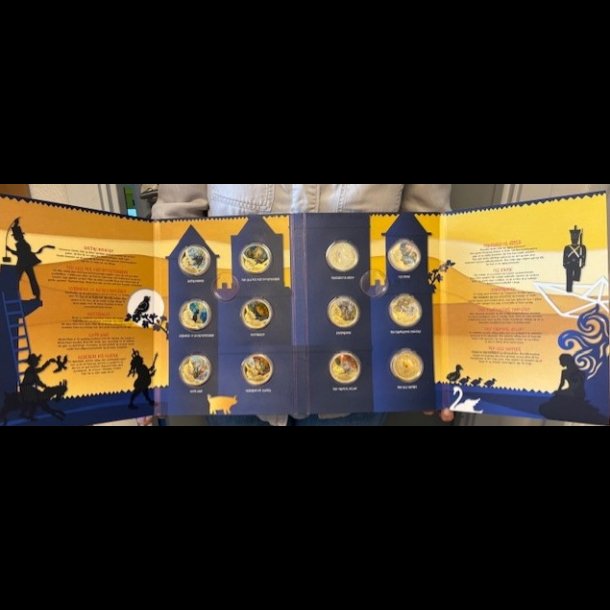 H C Andersen og de gode eventyr, 12 medaljer forgyldt med 24 karat guld, 2 eventyrbger,